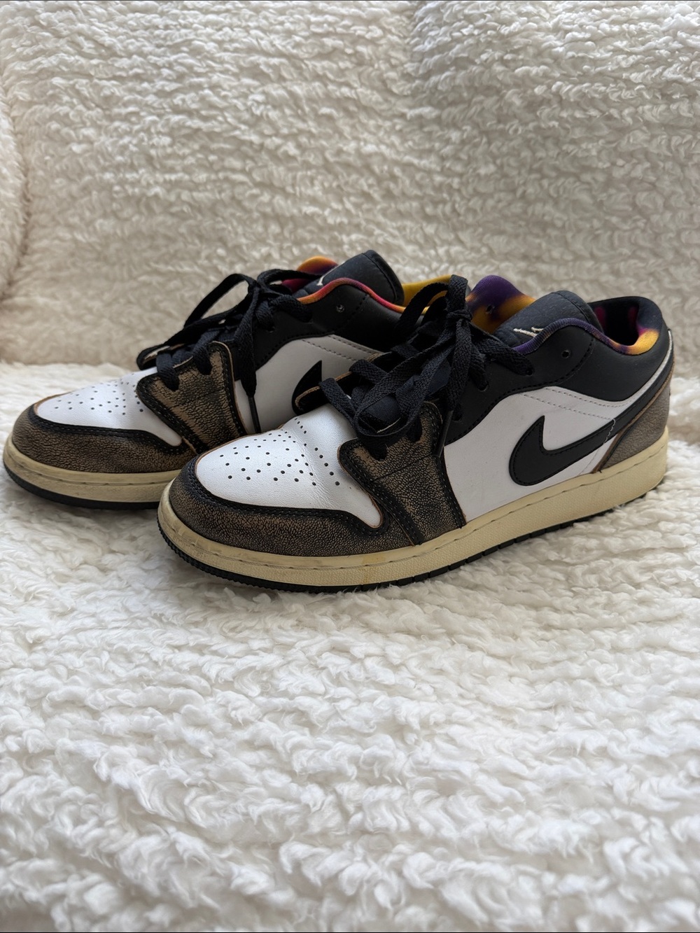 Nike Air Jordan’s Low-Top Sneakers in White, Black and Bronze. Size 7Y.